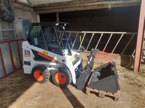 compact skid steer|smallest bobcat skid steer made.